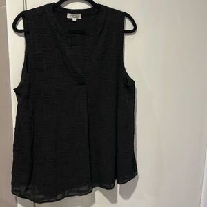 NWOT Sleeveless blouse.